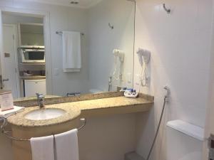 Phòng tắm tại Studio em Jurerê em hotel a beira-mar +6 ảnh