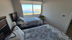 Postel nebo postele na pokoji v ubytování EDIFICIO MARES DE MONTEMAR