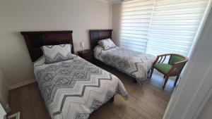 Postel nebo postele na pokoji v ubytování EDIFICIO MARES DE MONTEMAR + 15 fotografií