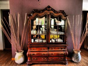 a dresser with a mirror on top of it at Hotel Villa Therese in Port-au-Prince