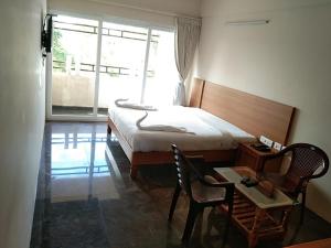 Fotografie z fotogalerie ubytování ACK Palacce Inn v destinaci Yercaud
