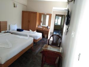Fotografie z fotogalerie ubytování ACK Palacce Inn v destinaci Yercaud