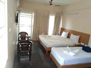 Fotografie z fotogalerie ubytování ACK Palacce Inn v destinaci Yercaud
