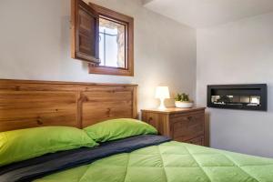 Postel nebo postele na pokoji v ubytování Finca Jabali