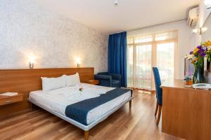 Postel nebo postele na pokoji v ubytování Complex Sunrise by HMG - All Inclusive