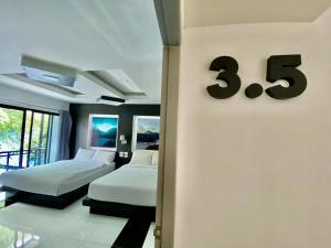 Postel nebo postele na pokoji v ubytování Natthapon Resort Kaeng Kachan