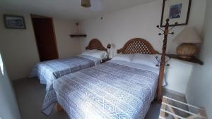 Hotel Noche Azul客房内的一张或多张床位