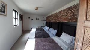 Hotel Noche Azul客房内的一张或多张床位