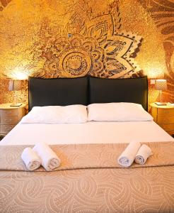 Ein Bett oder Betten in einem Zimmer der Unterkunft Royal Residence Leopoldstadt
