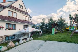 Vonkajšia záhrada v ubytovaní Apartament Na Wierchu