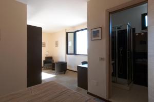 Postel nebo postele na pokoji v ubytování Hotel Ancore