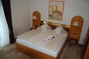 Postel nebo postele na pokoji v ubytování Hotel Friesengeist