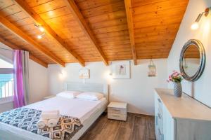 Postel nebo postele na pokoji v ubytování Amore Del Mare