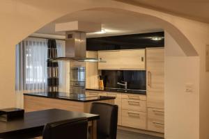 Kuchyň nebo kuchyňský kout v ubytování Villa Alpenhof