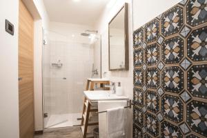 Kúpeľňa v ubytovaní B&B Pra da Lares + 24 fotografií