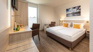 Postel nebo postele na pokoji v ubytování Hotel Am Wiesenweg l 24h check-in