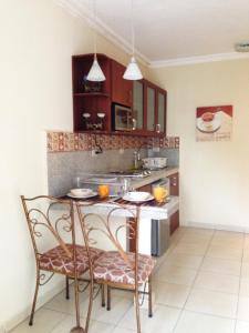 Køkken eller tekøkken på El Patio Suites II + 17 billeder