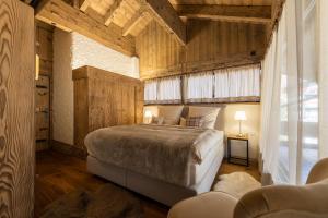 Postel nebo postele na pokoji v ubytování Villa Alpenhof