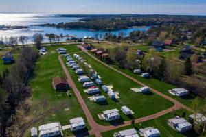 an aerial view of a parking lot with parked rvs at Käringsund Resort Camping in Eckerö