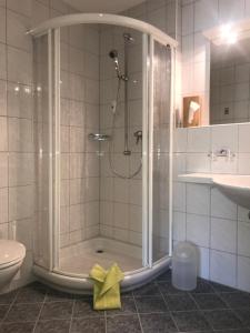 Vannas istaba naktsmītnē Hotel Garni Aurora