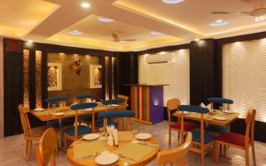 Restoran või mõni muu söögikoht majutusasutuses Hotel Aeropath Near IGI Airport Delhi