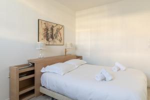 Giường trong phòng chung tại DIFY Stoppa - Lyon Parilly