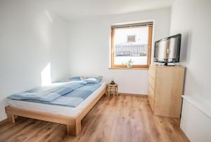 Letto o letti in una camera di Ferienwohnung mit Terrasse