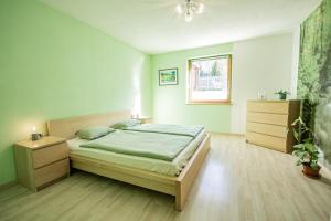 Letto o letti in una camera di Ferienwohnung mit Terrasse