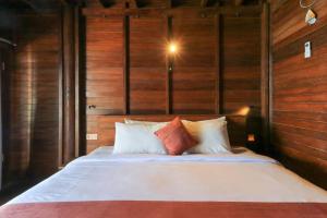 Waterside inn Nusa Penida客房内的一张或多张床位