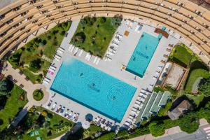 an overhead view of two swimming pools at Grand Hotel Pomorie - Medical spa in Pomorie