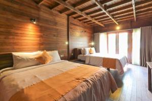 Waterside inn Nusa Penida客房内的一张或多张床位