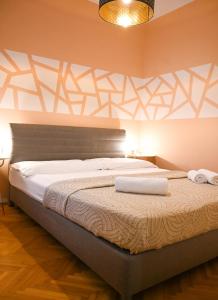Ліжко або ліжка в номері Exclusive Apartment Schönbrunn