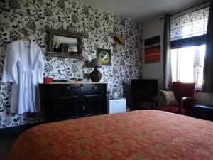 Kuchyň nebo kuchyňský kout v ubytování L'ancienne Boulangerie