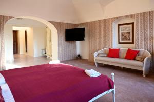 Postel nebo postele na pokoji v ubytování Hotel Bouček