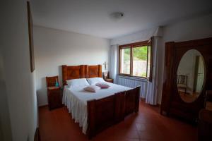 Кровать или кровати в номере Primo Sole