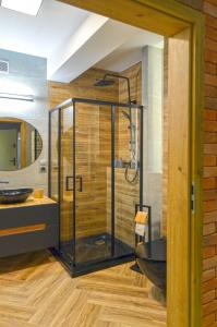 Koupelna v ubytování Sun&Sport Apartament AURUM prywatna sauna w cenie