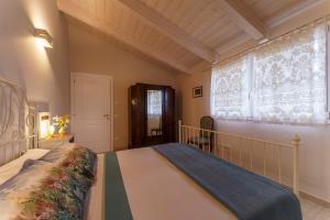A bed or beds in a room at Agriturismo Ca' Poldo