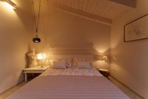 A bed or beds in a room at Agriturismo Ca' Poldo
