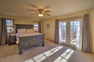 A bed or beds in a room at Secluded Marble Falls Family Home with Mtn Views!