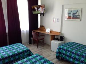 Postel nebo postele na pokoji v ubytování Hotel Baan