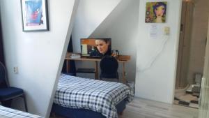 TV a/nebo společenská místnost v ubytování Hotel Baan
