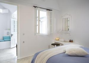 A bed or beds in a room at Altana Heritage Suites