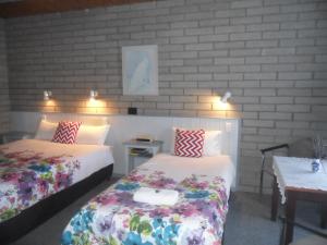 Postel nebo postele na pokoji v ubytování Motel Dimboola