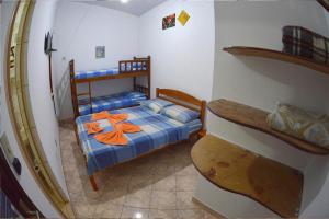 Postel nebo postele na pokoji v ubytování Pousada e Hostel Chapada Suites