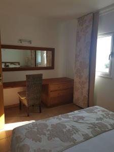 Кровать или кровати в номере Algarent Quinta Velha Jolie 125 Cabanas de Tavira