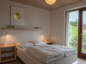 Postel nebo postele na pokoji v ubytování Holiday home Fanø XLVI
