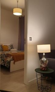 Postel nebo postele na pokoji v ubytování Beautiful Infante Apartment