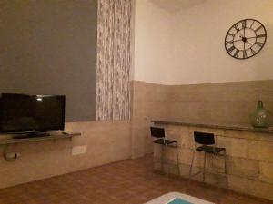 TV a/nebo společenská místnost v ubytování INDUSTRIAL LOFT + 9 fotografií