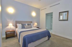 Postel nebo postele na pokoji v ubytování PalmCove DriftAway + 25 fotografií