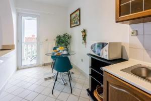 Kuchyňa alebo kuchynka v ubytovaní Apartments ANITA